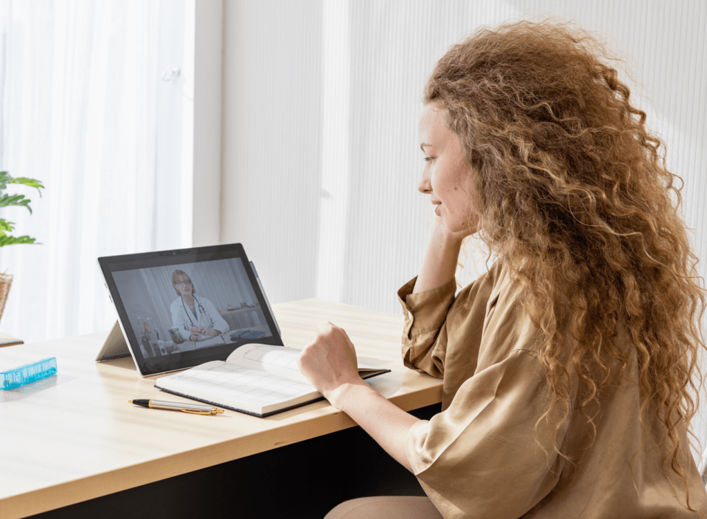 Woman talking to doctor online