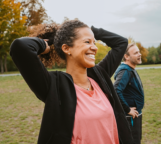 Person exercising outdoors and enjoying an active lifestyle with friends