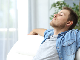 A man sitting on a couch