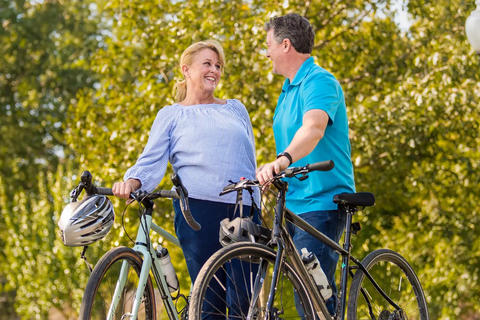 Couple riding bikes